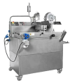 Enrober - stroj na polievanie cukroviniek